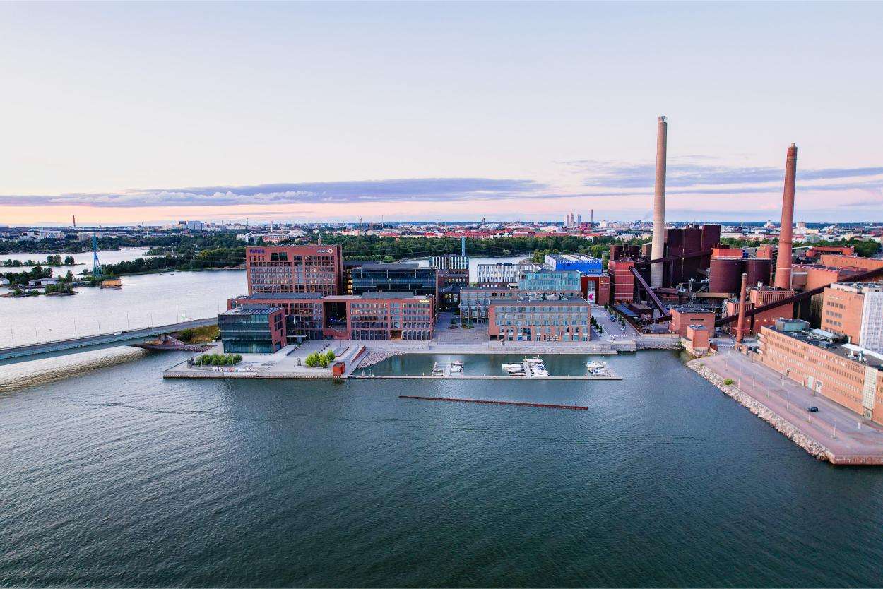 Aerial view of industrial buildings by the waterfront