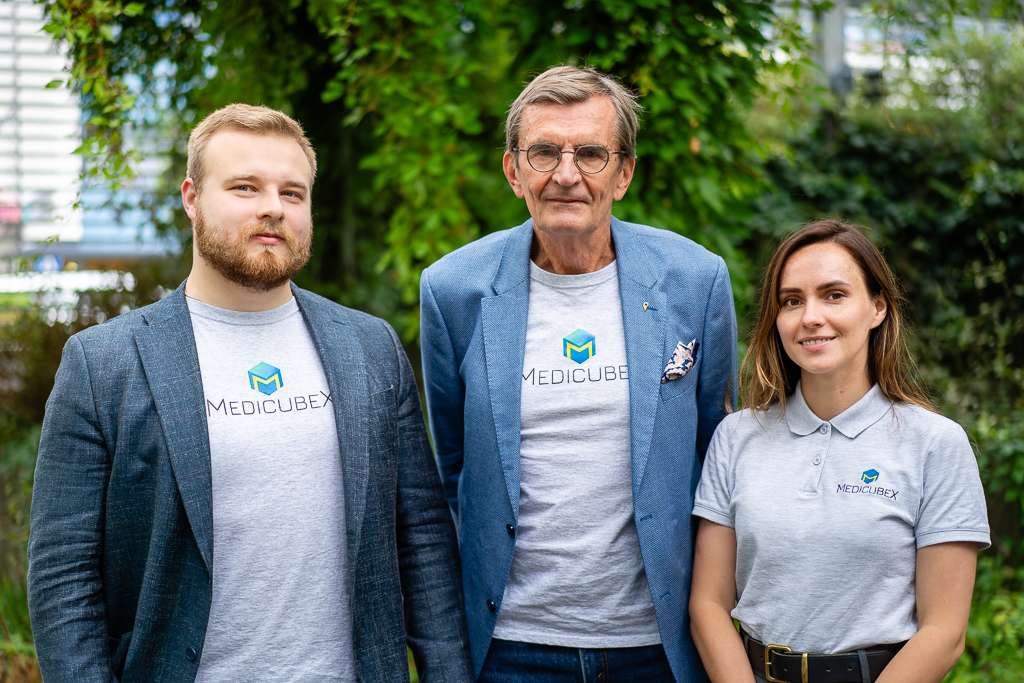 Team members of Medicubex smiling outdoors, captured by Photographer Helsinki, specializing in employee headshots and professional headshots.